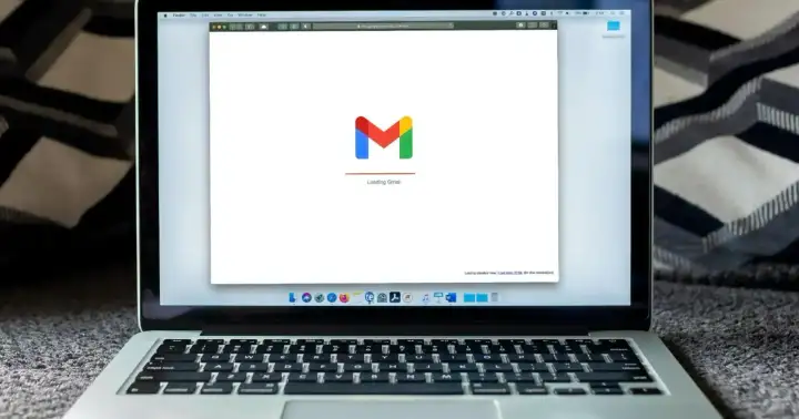 Laptop showing an email marketing campaign being built